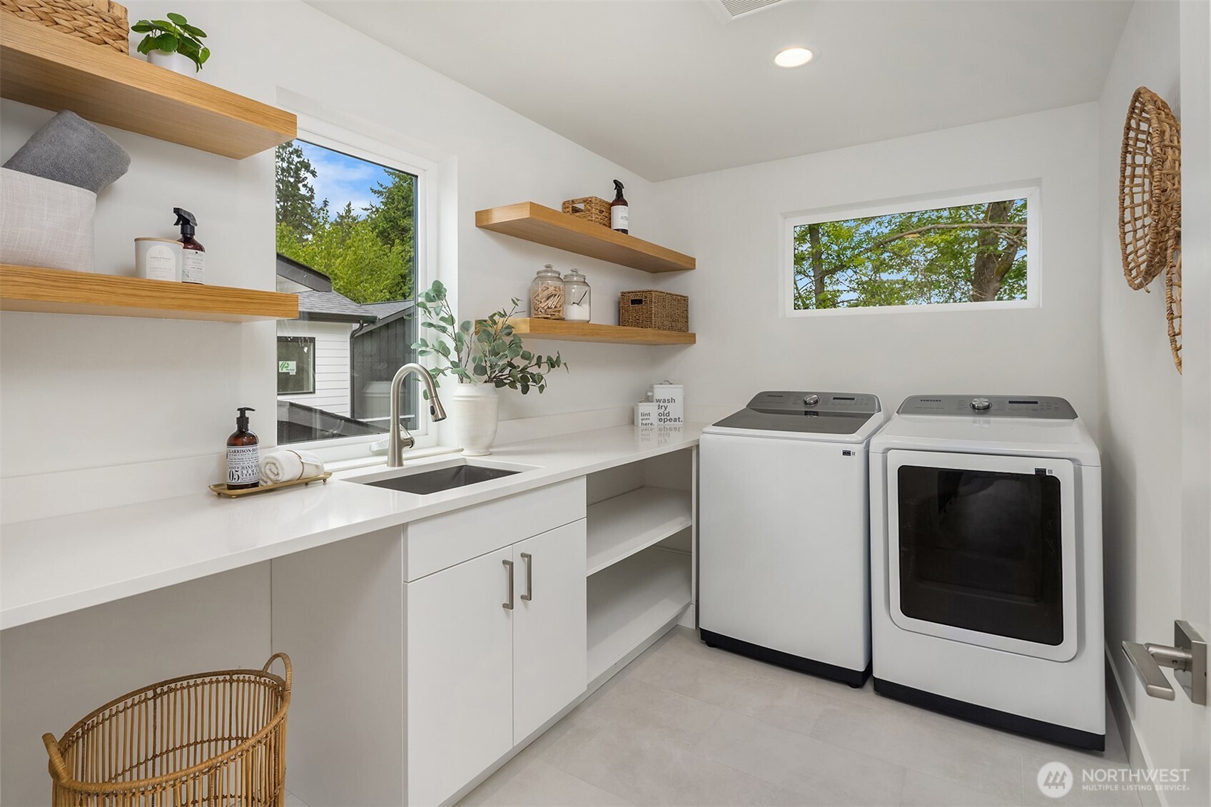 Dedicated laundry room with storage space