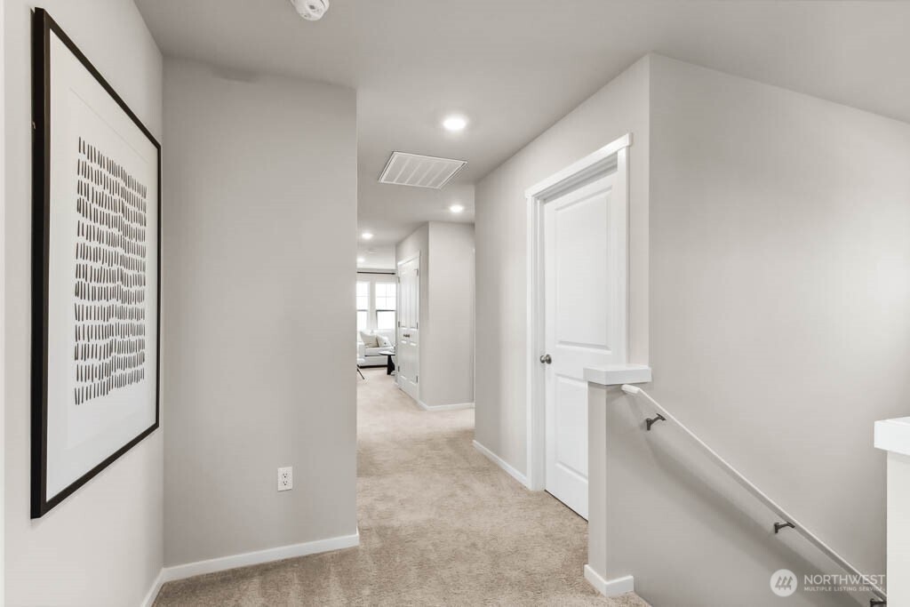 Primary bedroom. Photo is representational. Actual home is under construction. Colors, details and finishes will vary. See site agent for details.