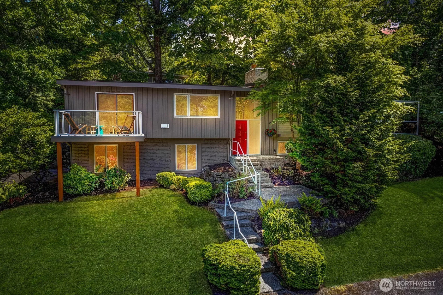 Welcome to 5 Wembley Lane, a prime corner lot on a private street of 10 homes that surround one of the last remaining community pools on Mercer Island.
