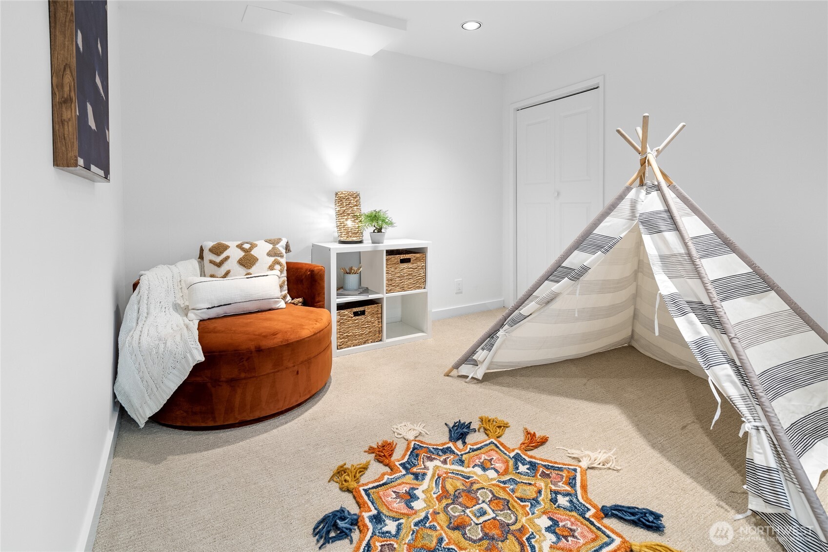 Second finished room off the rec room with a separate closet is a great space for play, a spot to read a book, or whatever else needed.