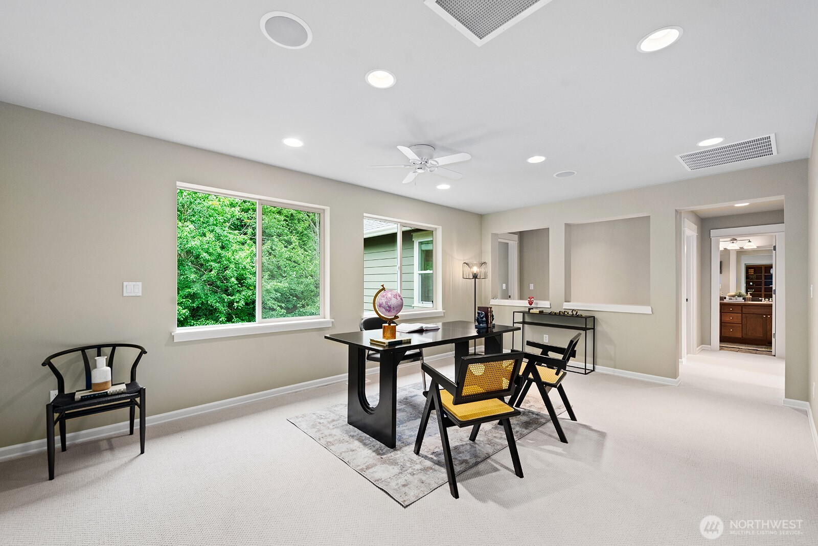 The upstairs bonus room/loft has multiple potential uses including an office, playroom, or you can decide.
