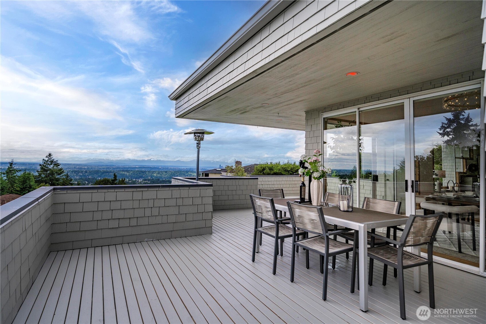 Elevated view deck offers a front-row seat to unforgettable sunsets, framed by Mt. Rainier, Lake Washington, and downtown Seattle.