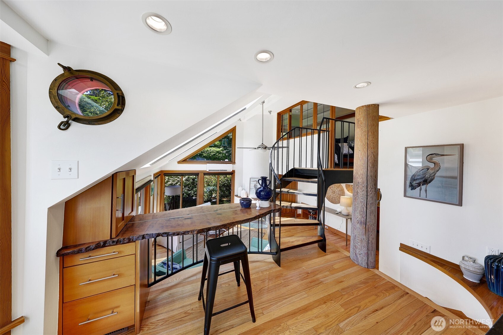 A floating home is not complete without a porthole.  Don't miss it in the upper left corner here!