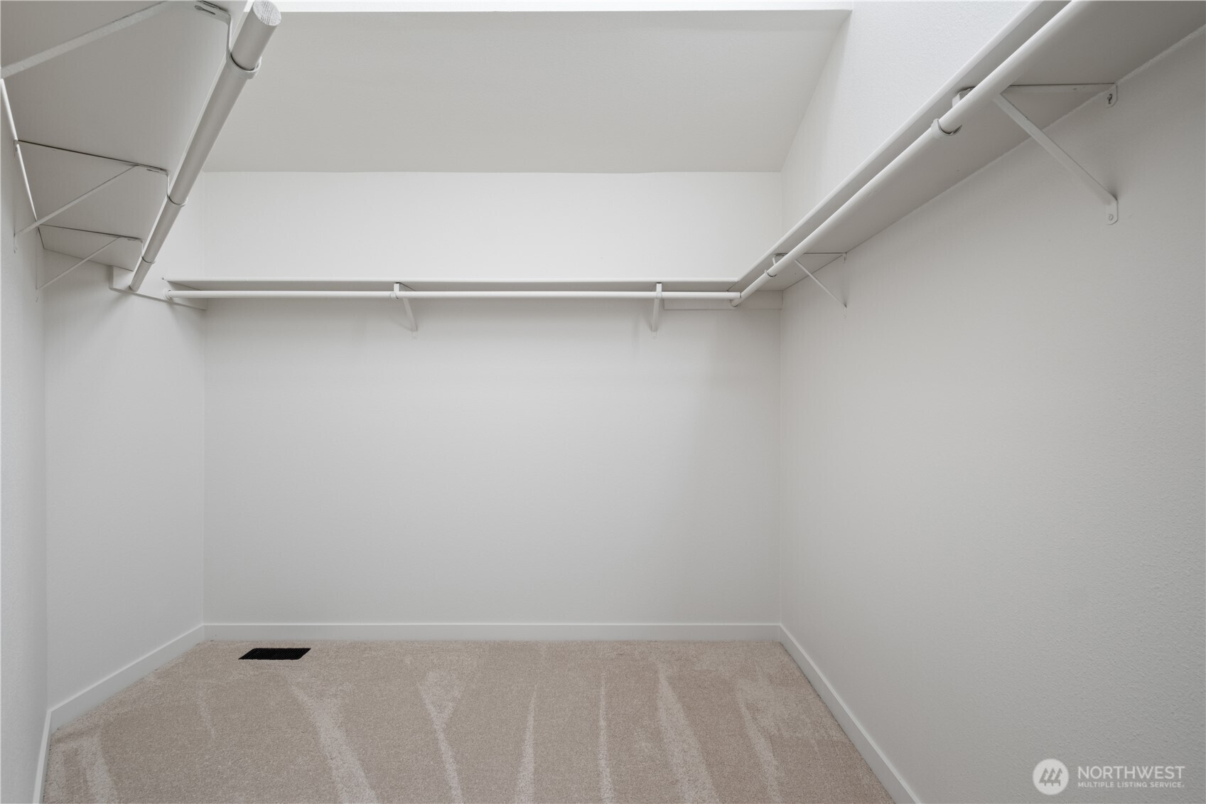 Oversized primary closet with plenty of space for your customization!