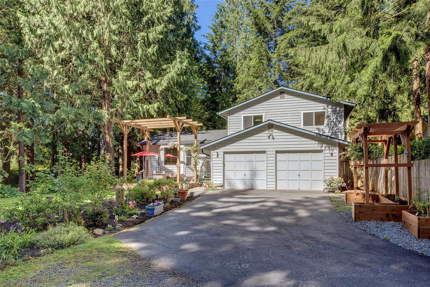 Home is situated on one parcel, and faces the vacant second parcel.