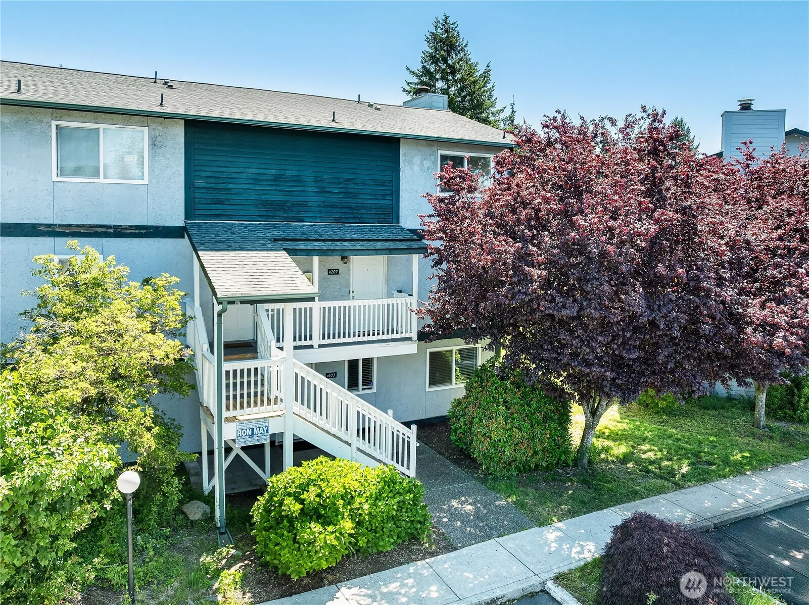 Spacious end-unit two level condo with two bedrooms, two bathrooms, 1,140 square feet of space.