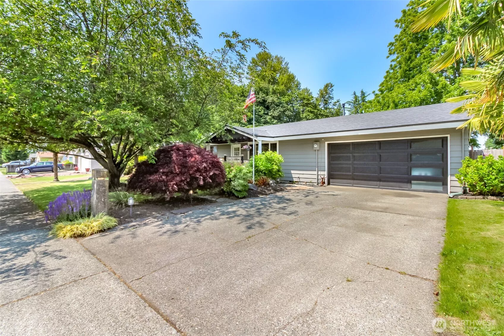 Beautiful updates rambler with 2 car garage and large back yard.