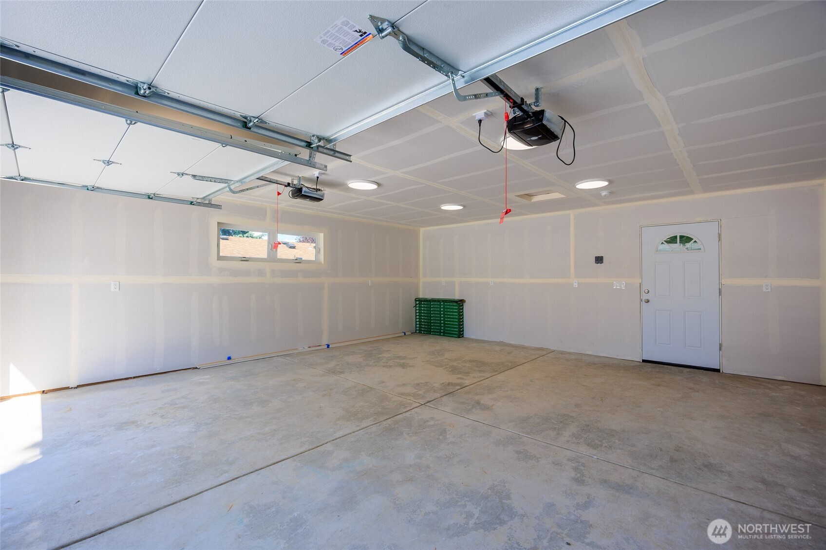 Imagine all the projects & hobbies in this expansive garage.