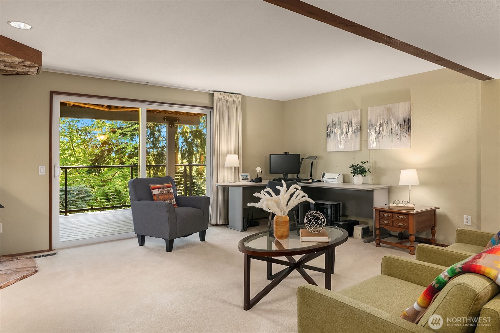 The Family room offers deck access and a neutral palette for extended living, work-from-home or playroom.