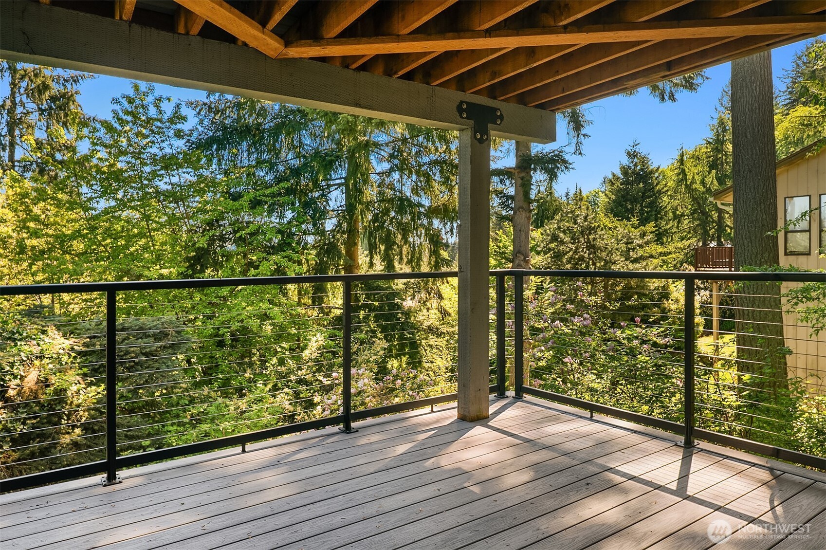 The covered deck on the 2nd level is offered from the family room.