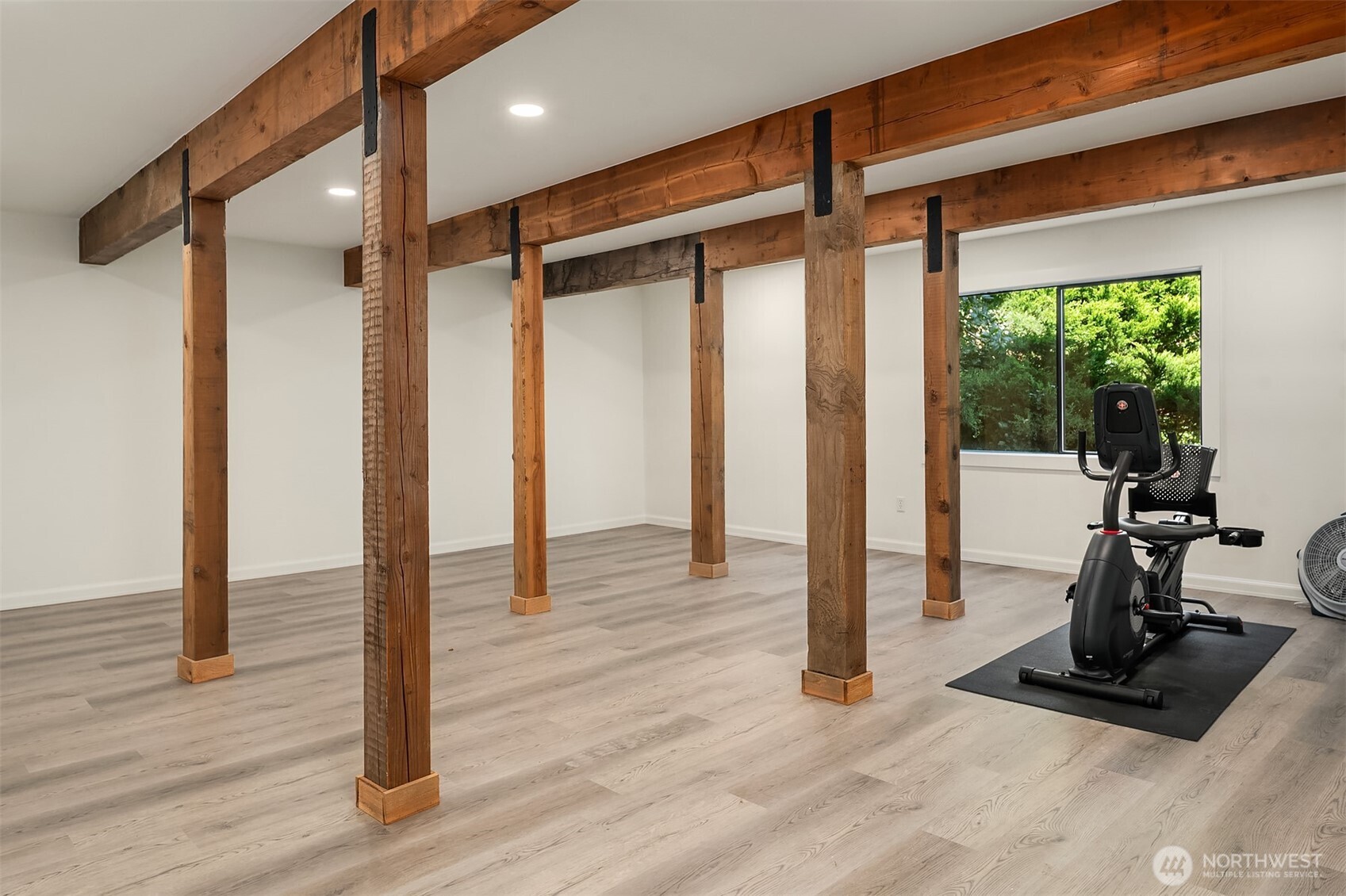 Gym, storage, playroom, work from home? This versatilve room offers a light and bright space with private patio.