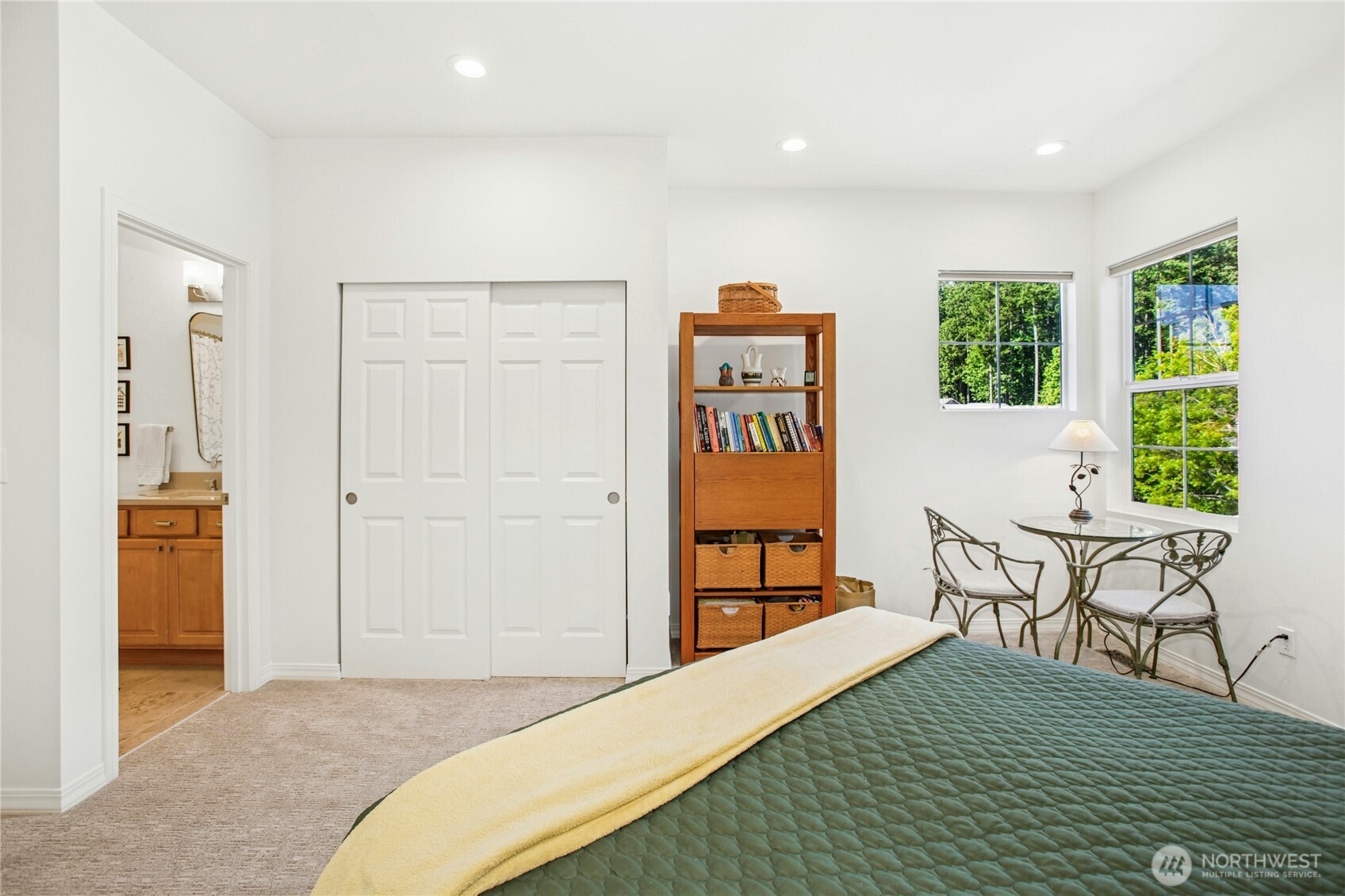 Here you can see the double closet and door to the bathroom