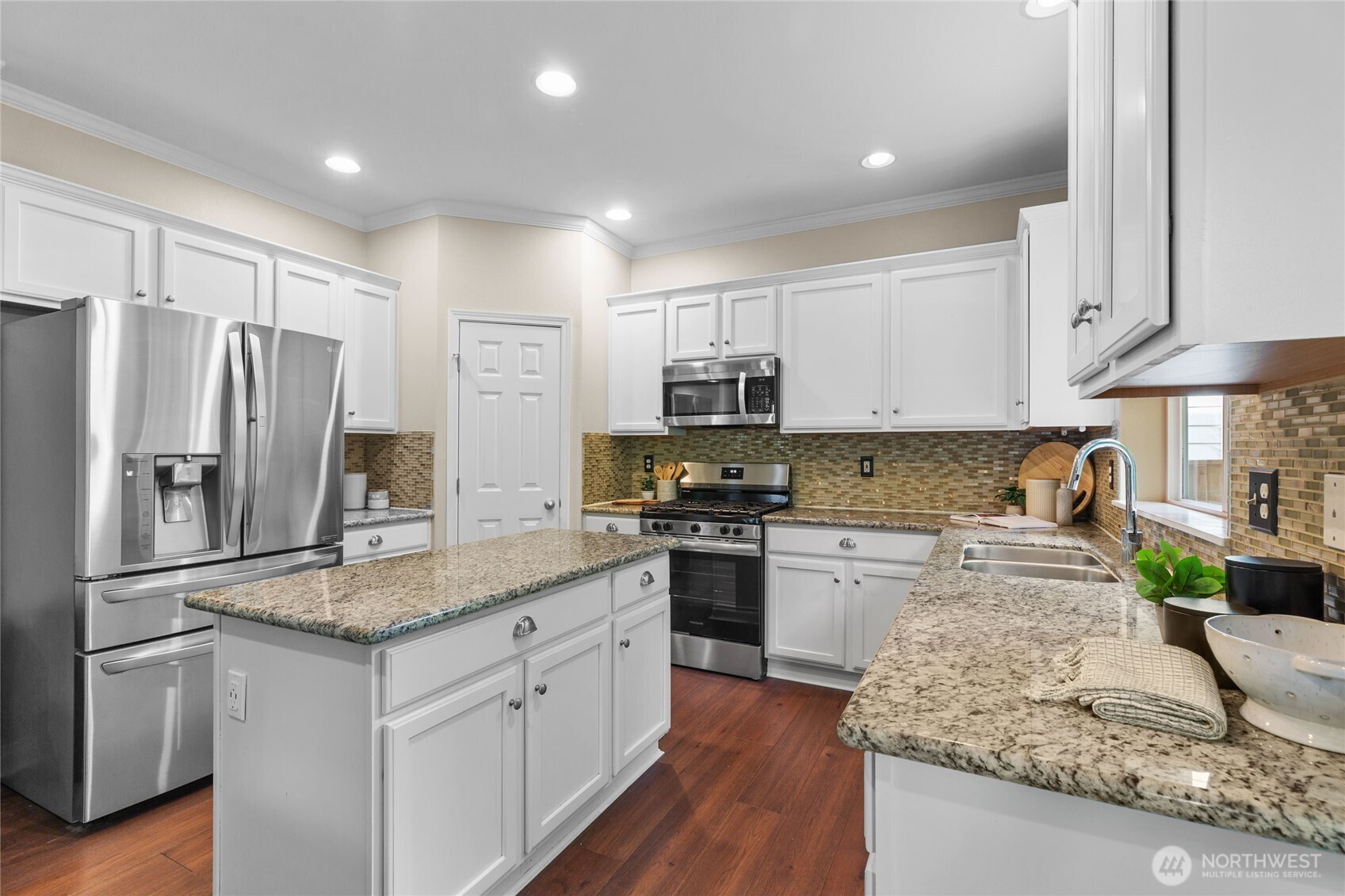 Stainless steel appliances included.