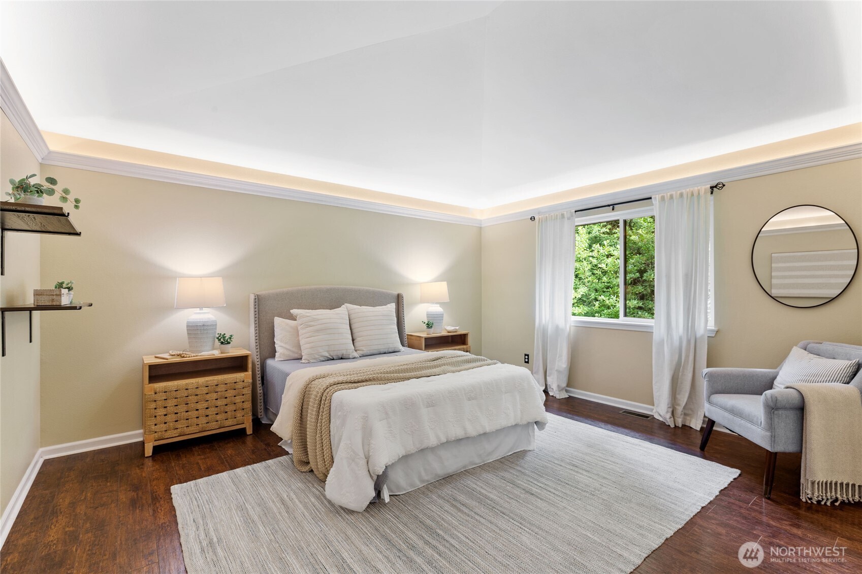 Spacious and serene primary bedroom.