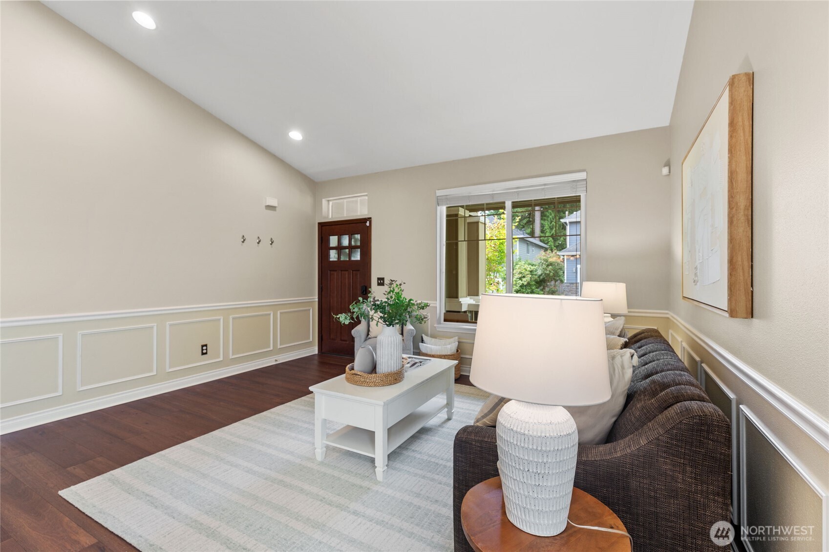 Shadow box molding and a charming front entry.