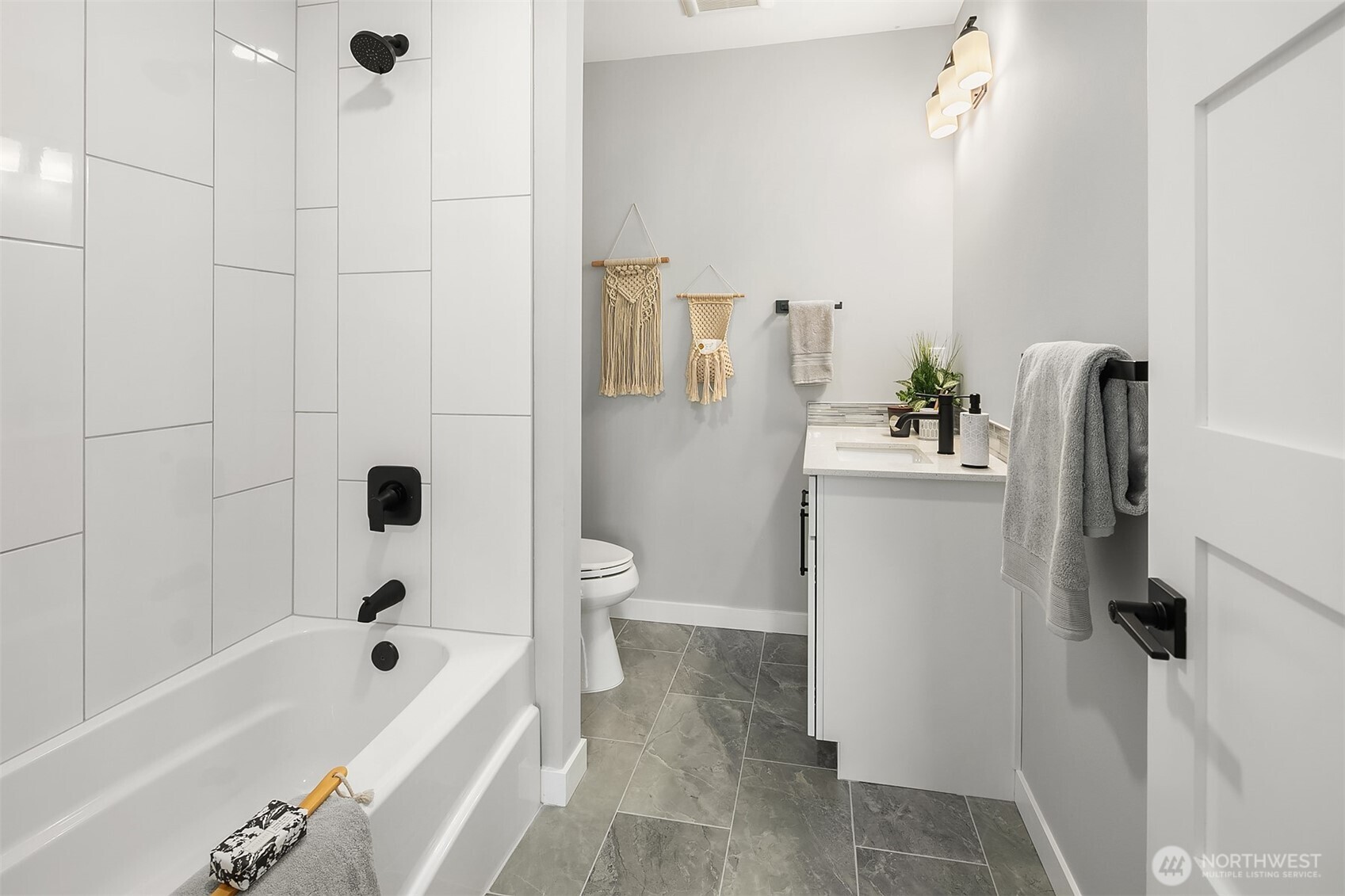 All interior photos are from Model Unit #104 in 2022. Unit #101 floorplan is the reverse from these.