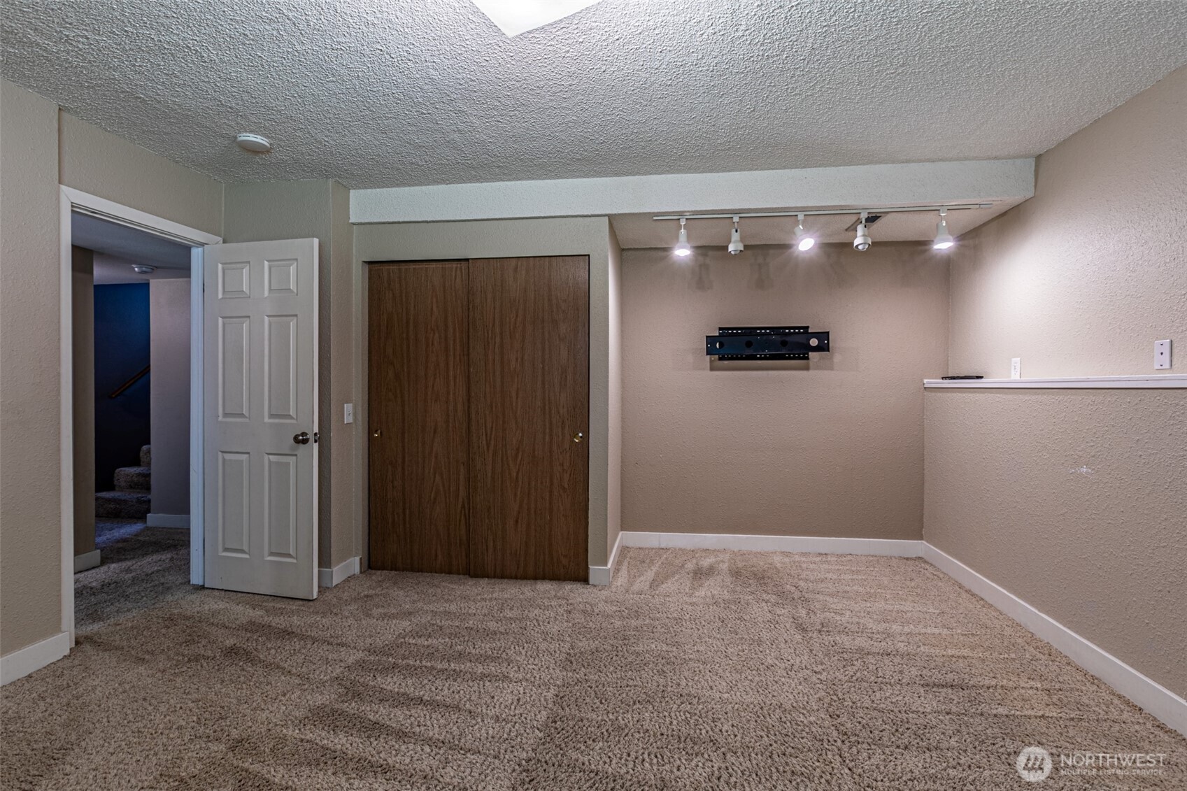 Another view of the downstairs bedroom.