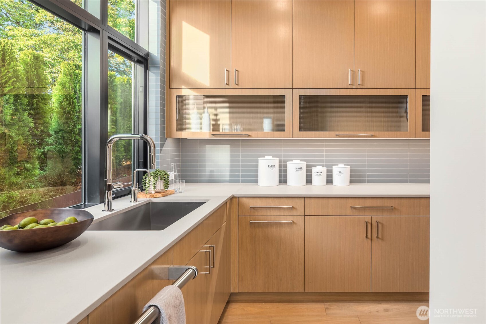 Custom Euro-Style Frameless Cabinets Throughout with Flush Rift Oak Doors
