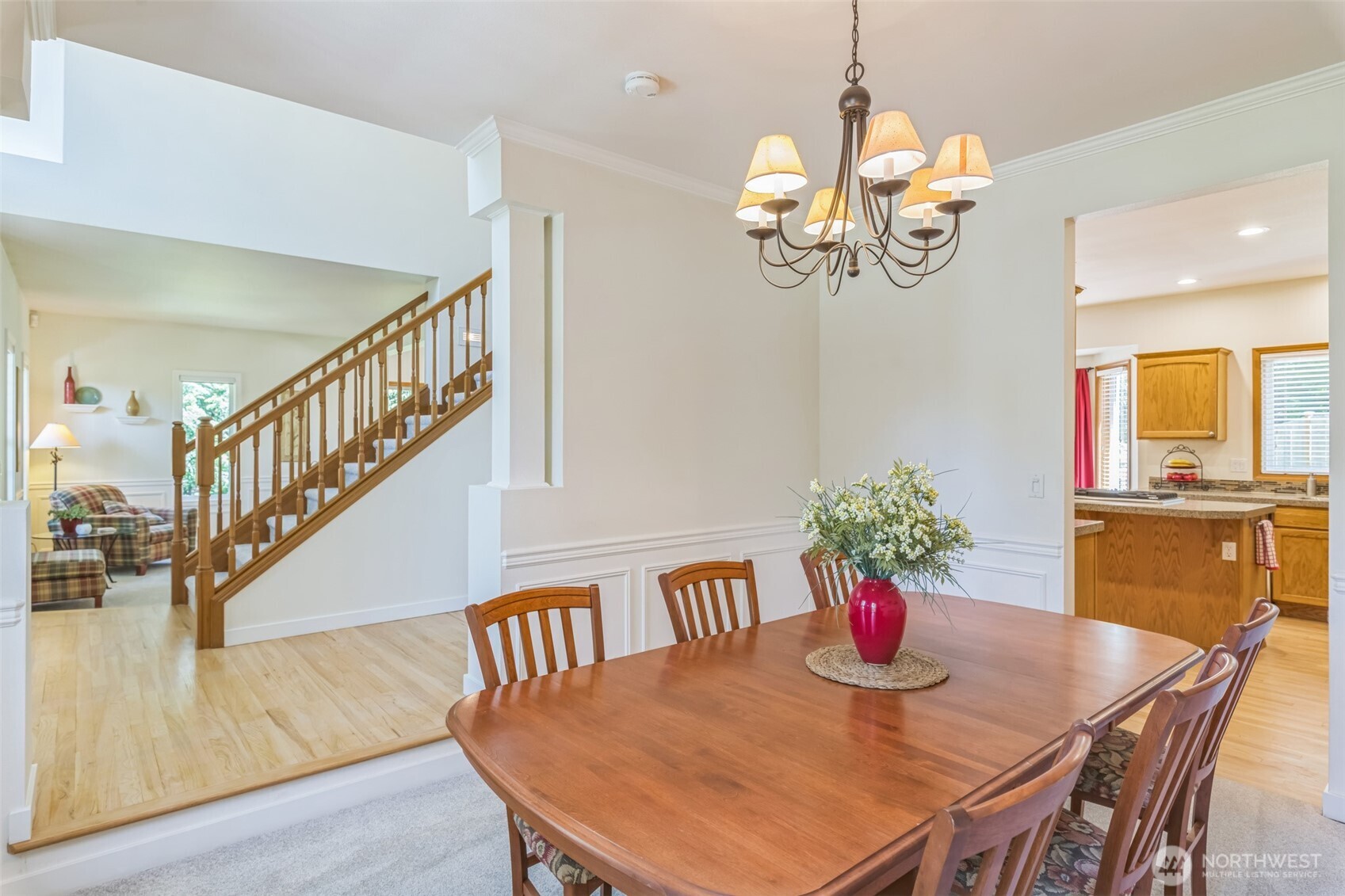 Enter the home and notice the newly refinished oak floors. Beautiful dining room to the right.