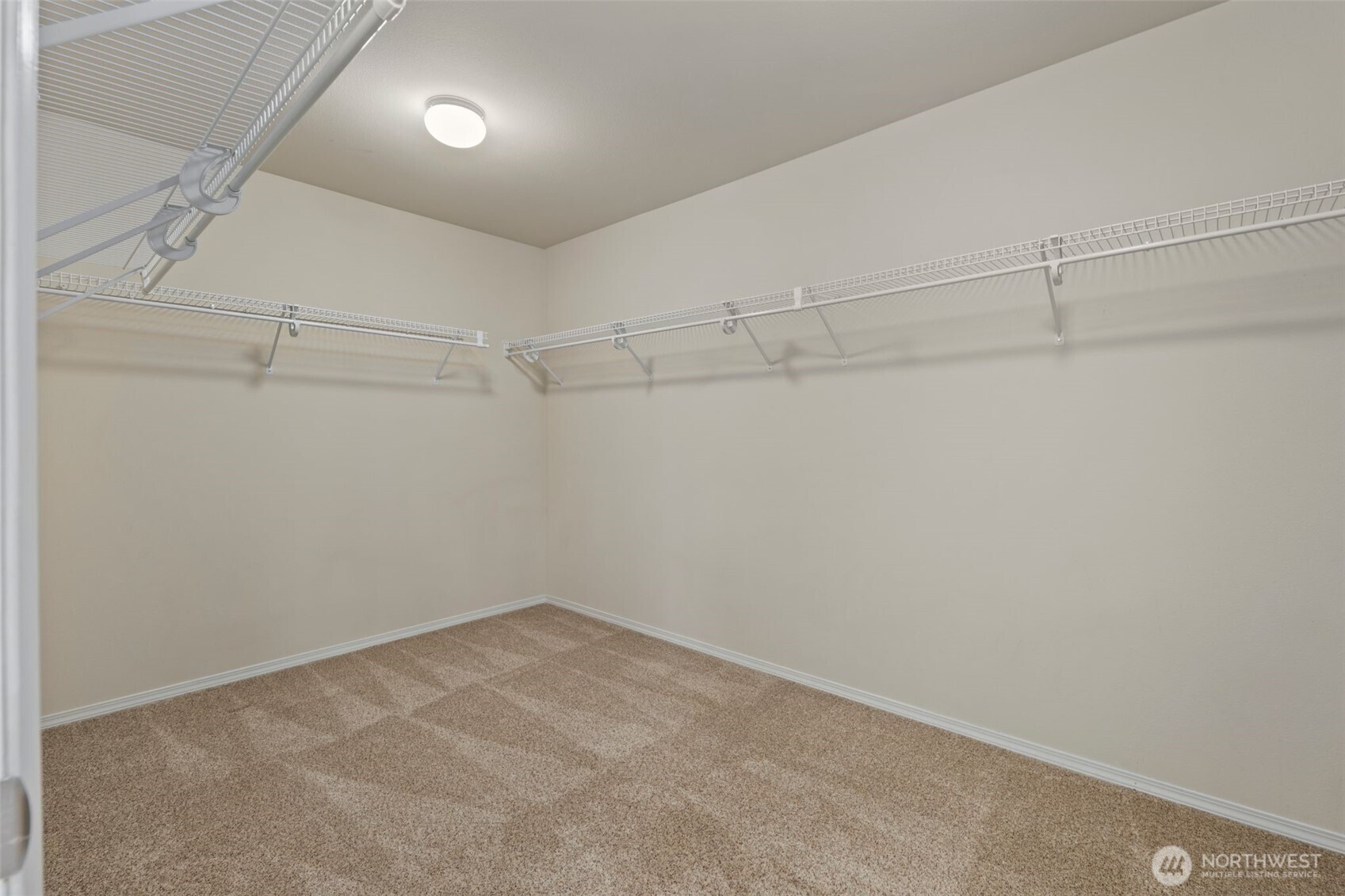Primary bedroom's walk-in closet