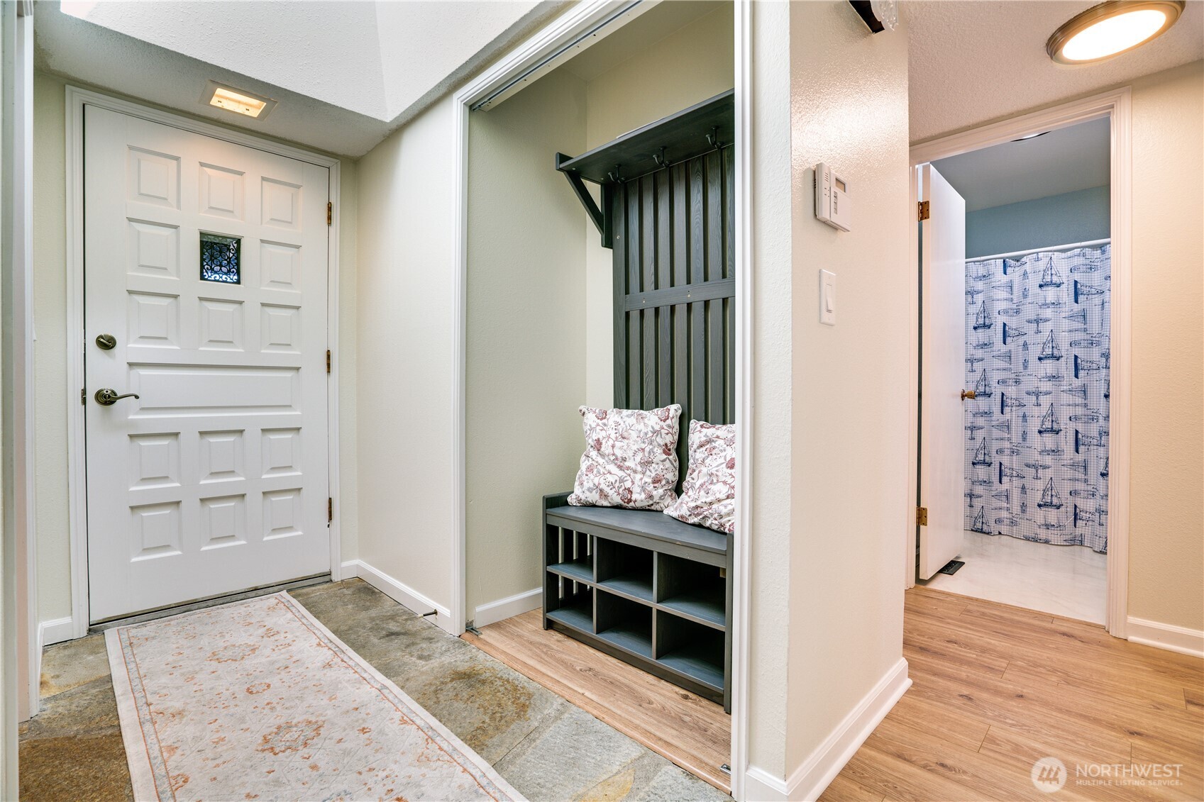Corner wood-burning fireplace and entrance to outdoor patio area. Your patio area is a Limited Common element allowing exclusive use to you as a homeowner.