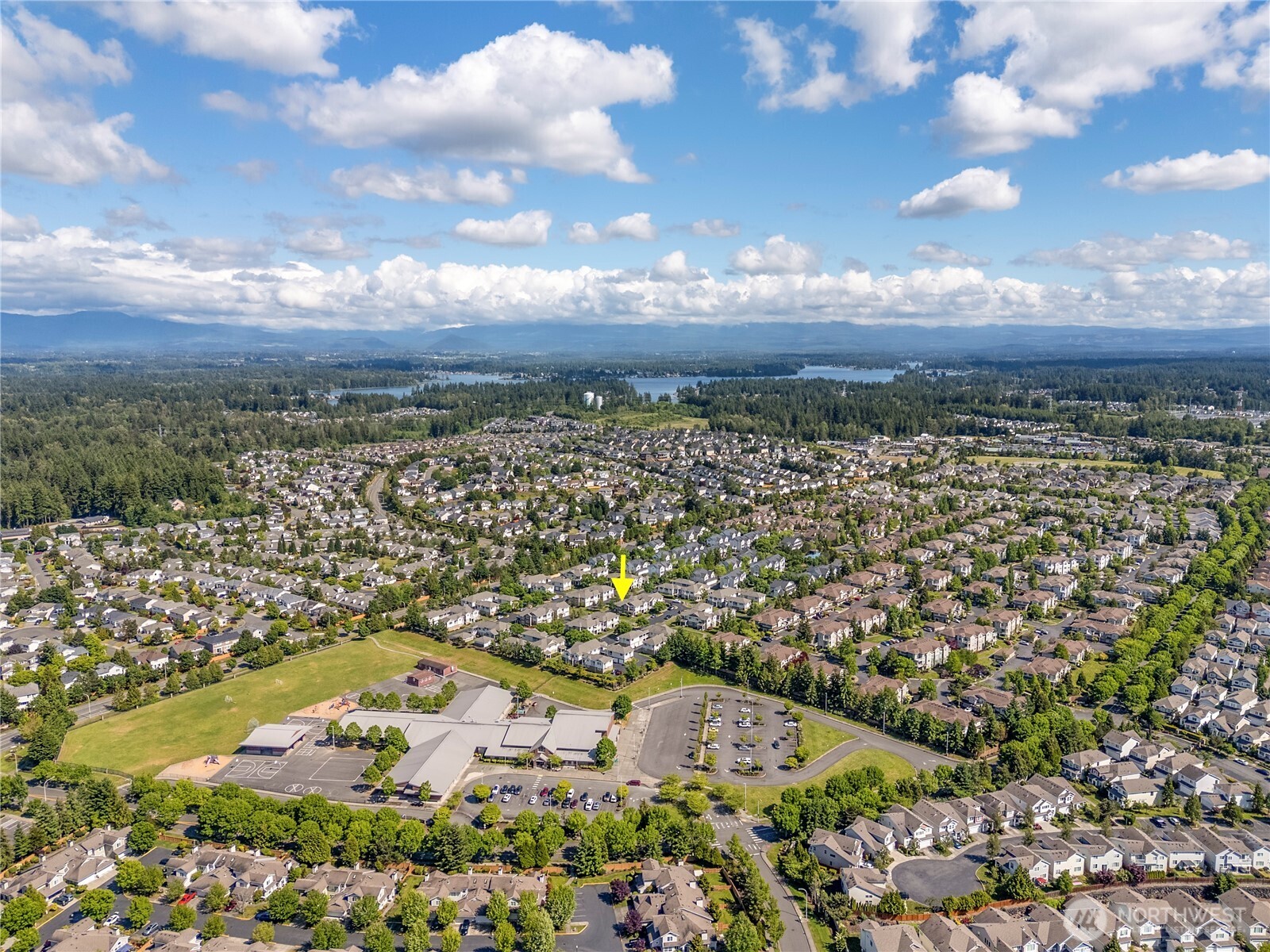 The photos shows most of the communities at the top of the hill and how close Lakeland Hills Elementary School is to the home.