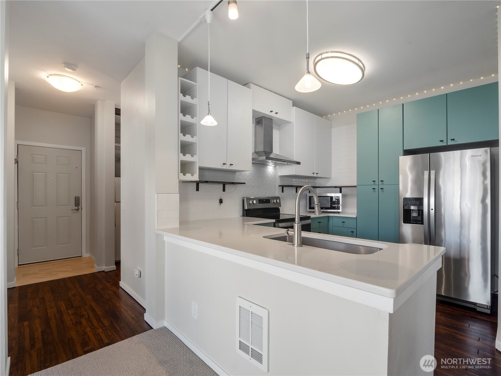 The dining area is large and offers expansive territorial views. It opens through the large slider to the private balcony where you can enjoy your morning cup of coffee or take in a nap in the sun.