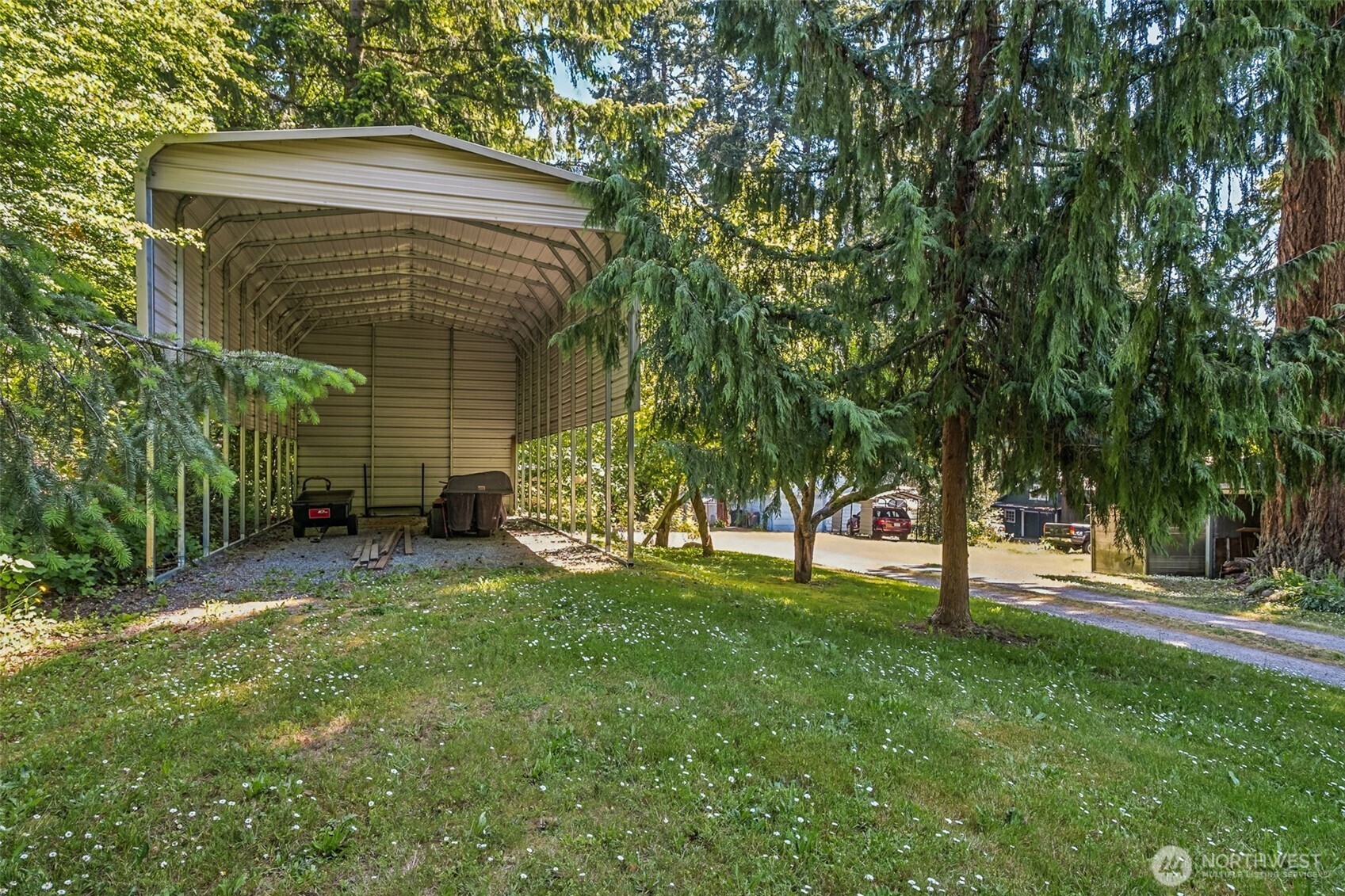 Covered RV Parking and long driveway for ample privacy!