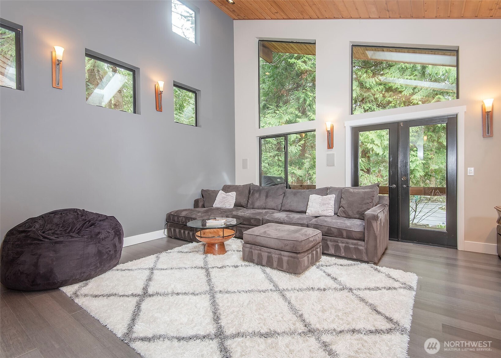 Primary bedroom with a view of the Puget Sound and Olympic Mountains.