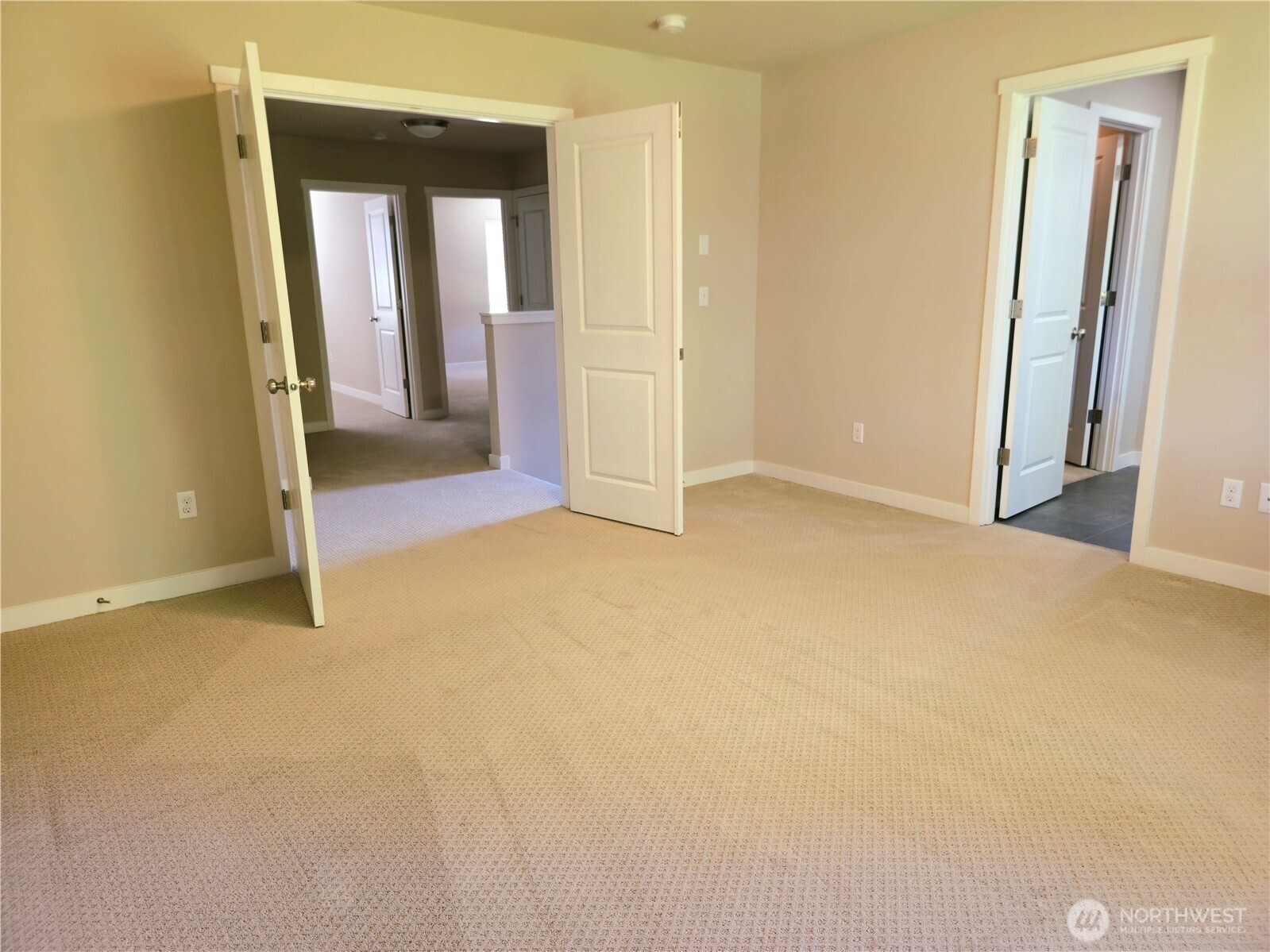 Double doors welcome you into the master retreat!