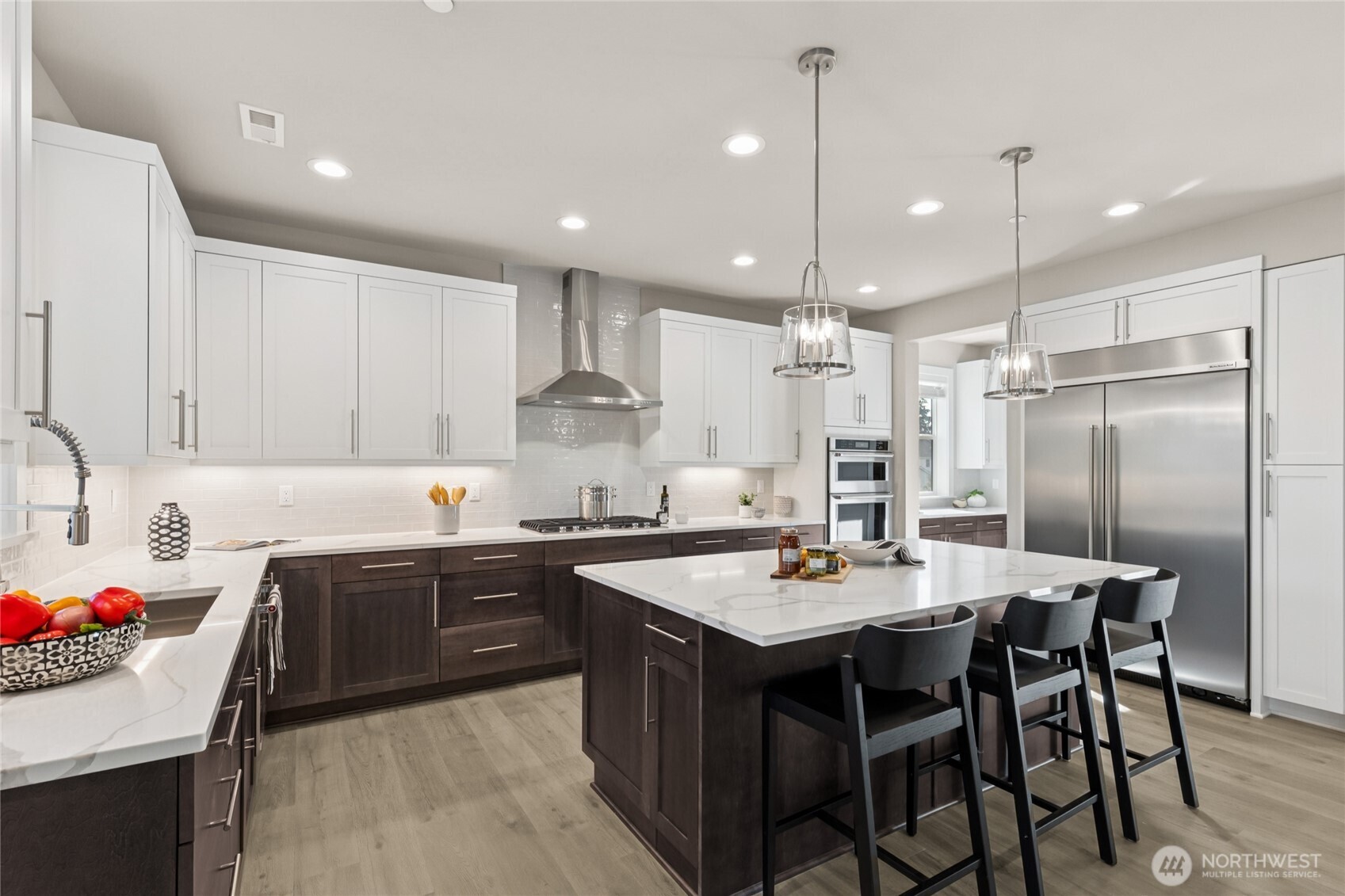Modern kitchen is equipped with top-of-the-line appliances. For representation purposes only colors may vary.