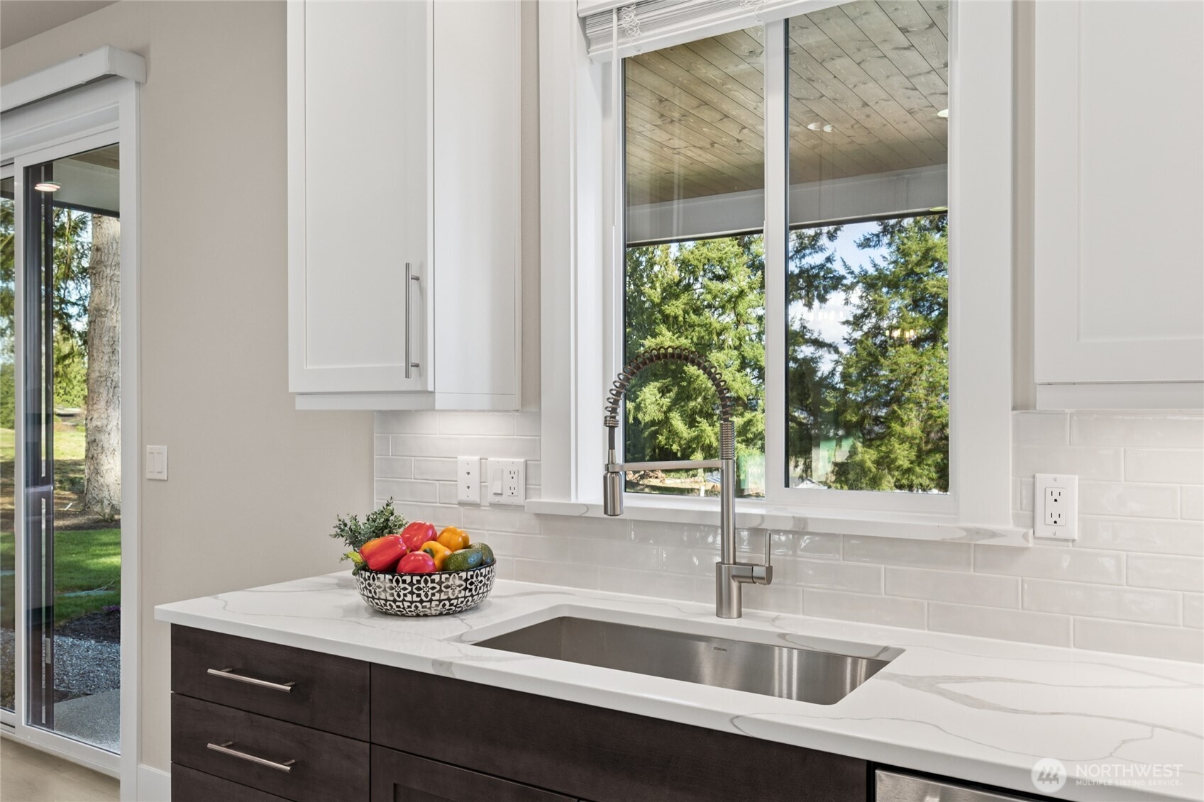 Kitchen sink looks out to backyard! For representation purposes only colors may vary.