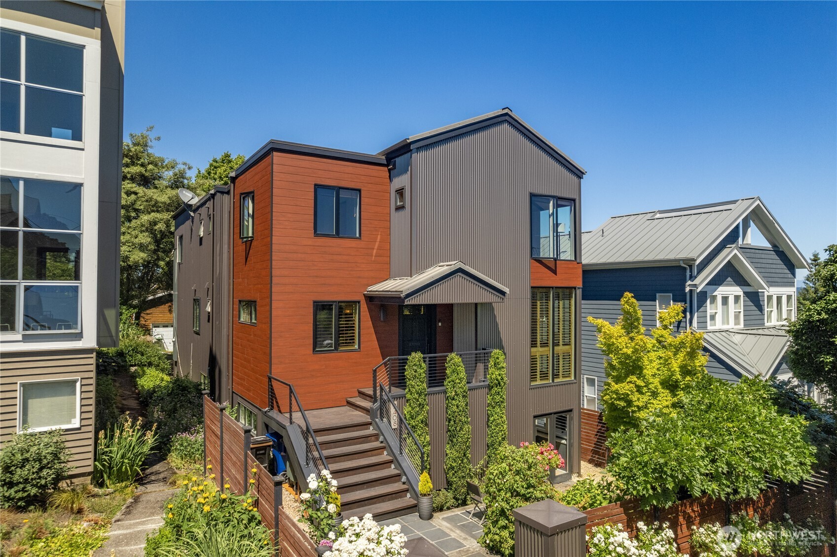 Complete exterior reimagining with commerical grade zero maintenance composite siding and new windows