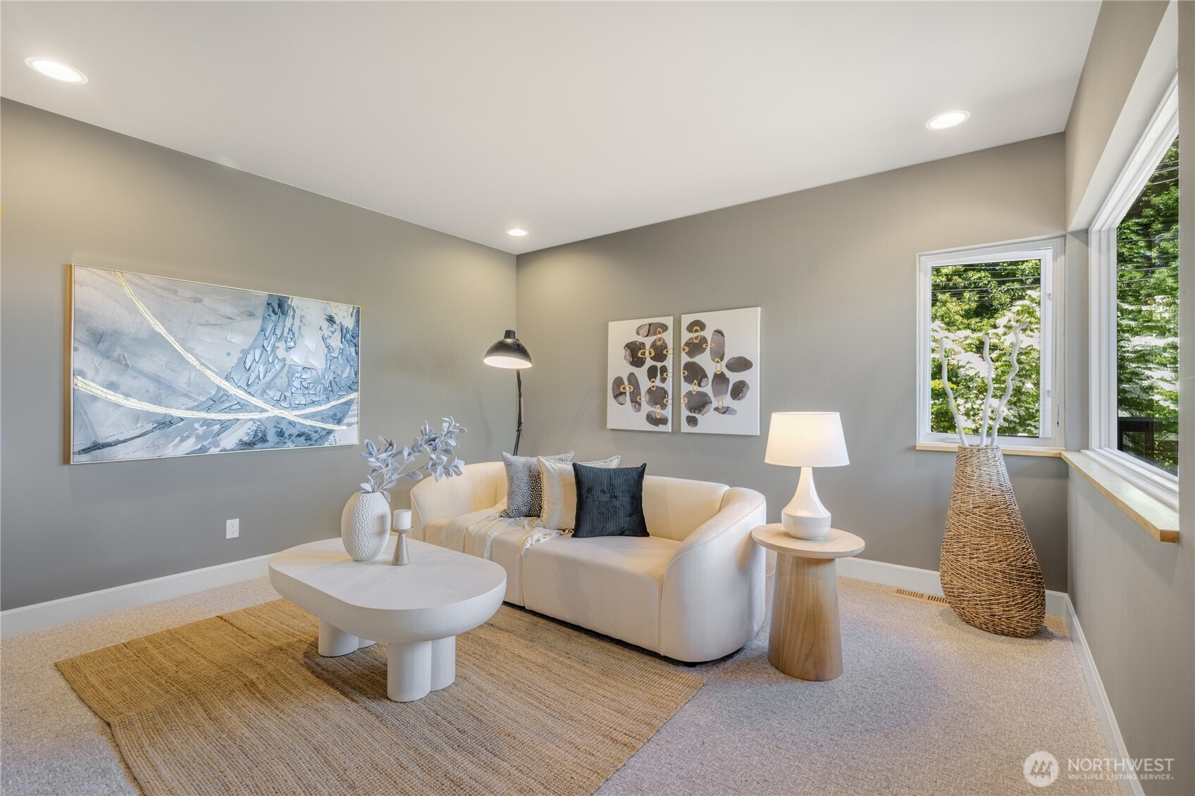 The media space off the kitchen is connected but separate - allowing for multiple entertainment zones.