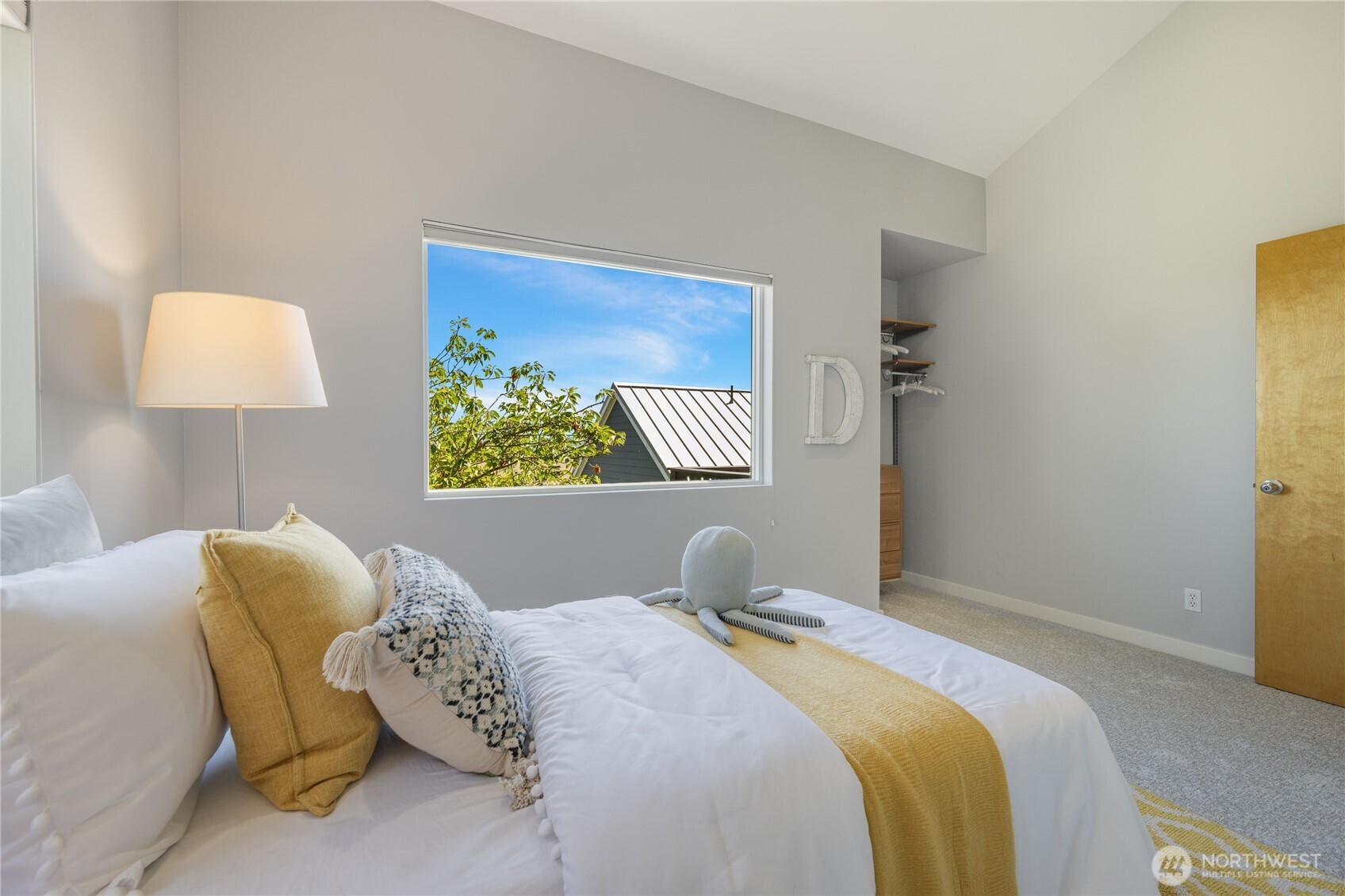 One of the four bedrooms on the upper level