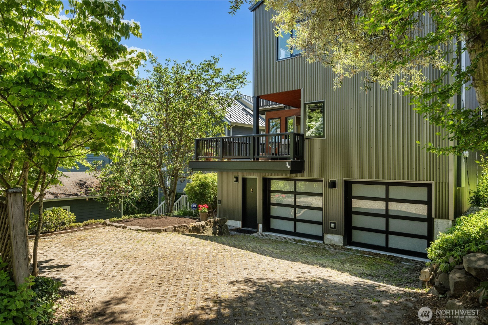 Peaceful backyard with access off alley to the garage.