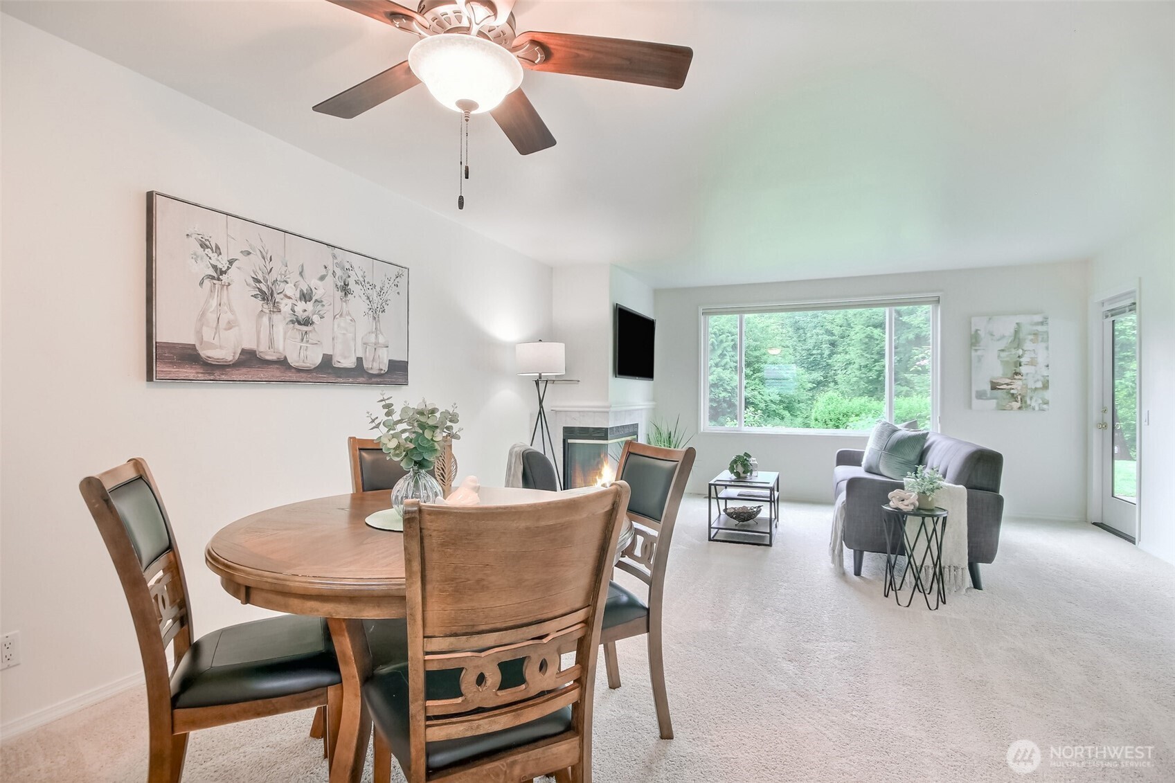 Enjoy your electric fireplace in your living and dining room with direct access to your patio.