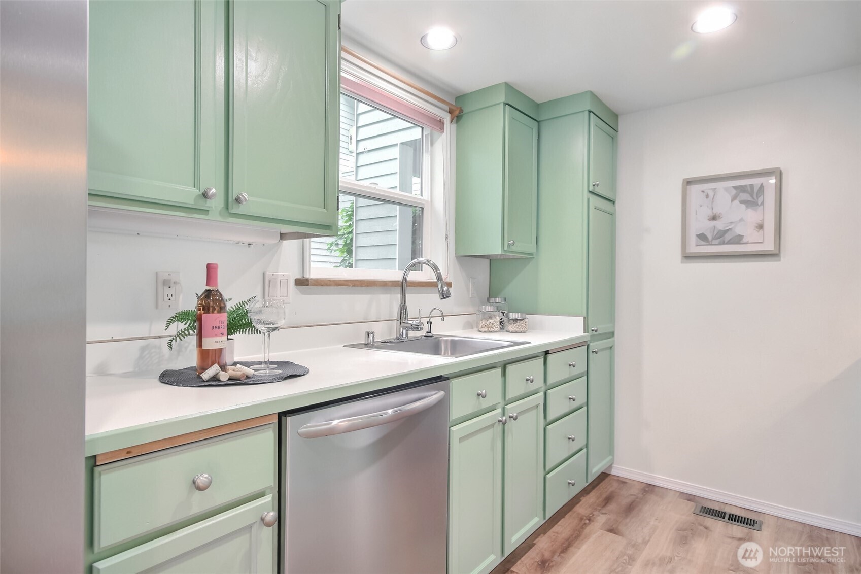 Light kitchen with window over sink