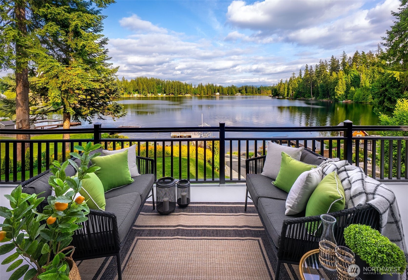 The open-concept layout features a spacious living room with seamless indoor-outdoor flow, perfect for cozy evenings watching the sunset.