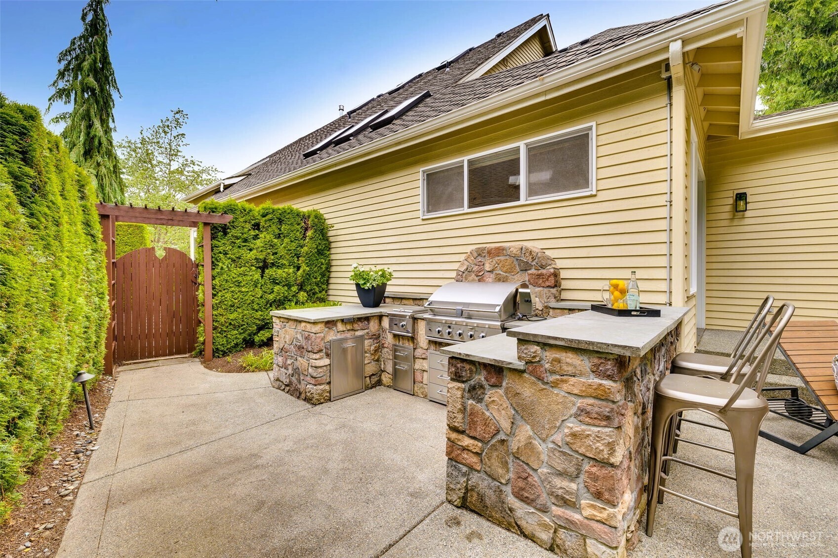 Built-in barbeque with fridge and burner.
