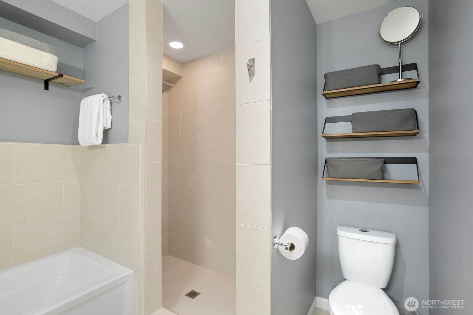 Primary bathroom has both a tub and shower.