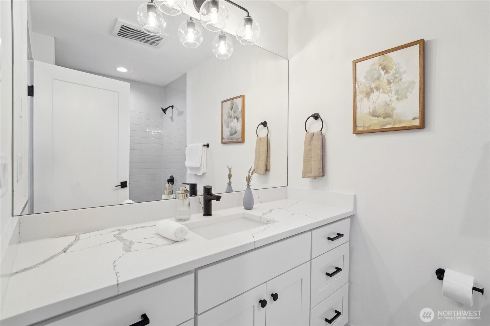 Photos of staged unit, 20313A. Level 3 common bath