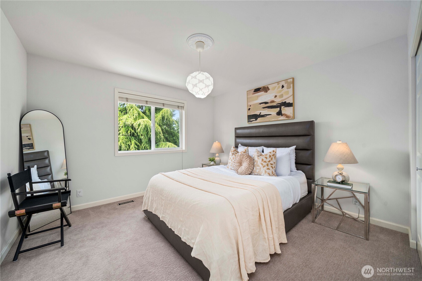 A spacious second bedroom upstairs, offering privacy and comfort.