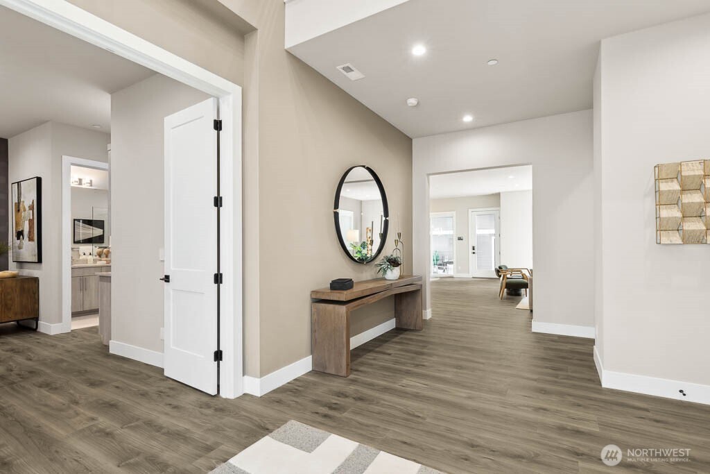 Open entry and generous room sizes throughout! Main floor home office or bedroom with 3/4 bath & walk in closet.