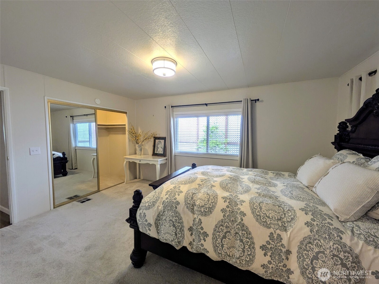 Primary bedroom is huge with large closet and adjoining bathroom