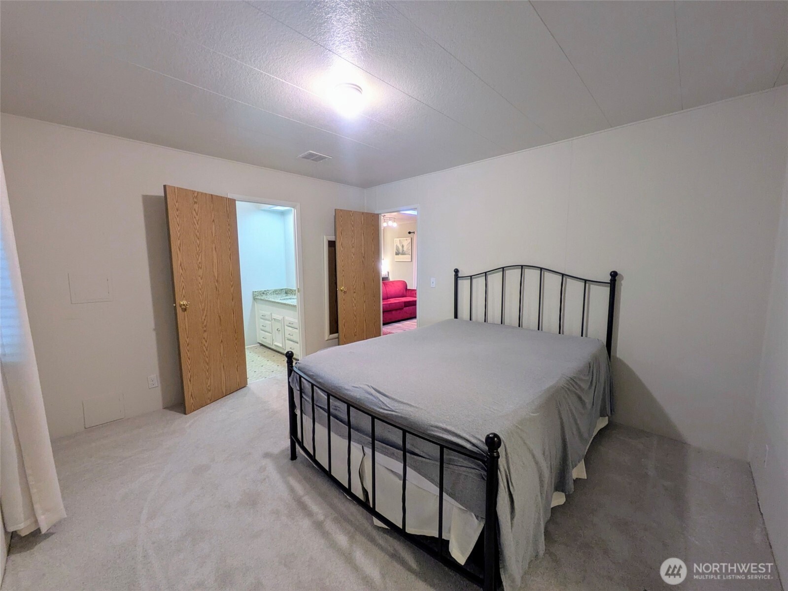 Second bedroom is larger than most with a big walk-in closet.