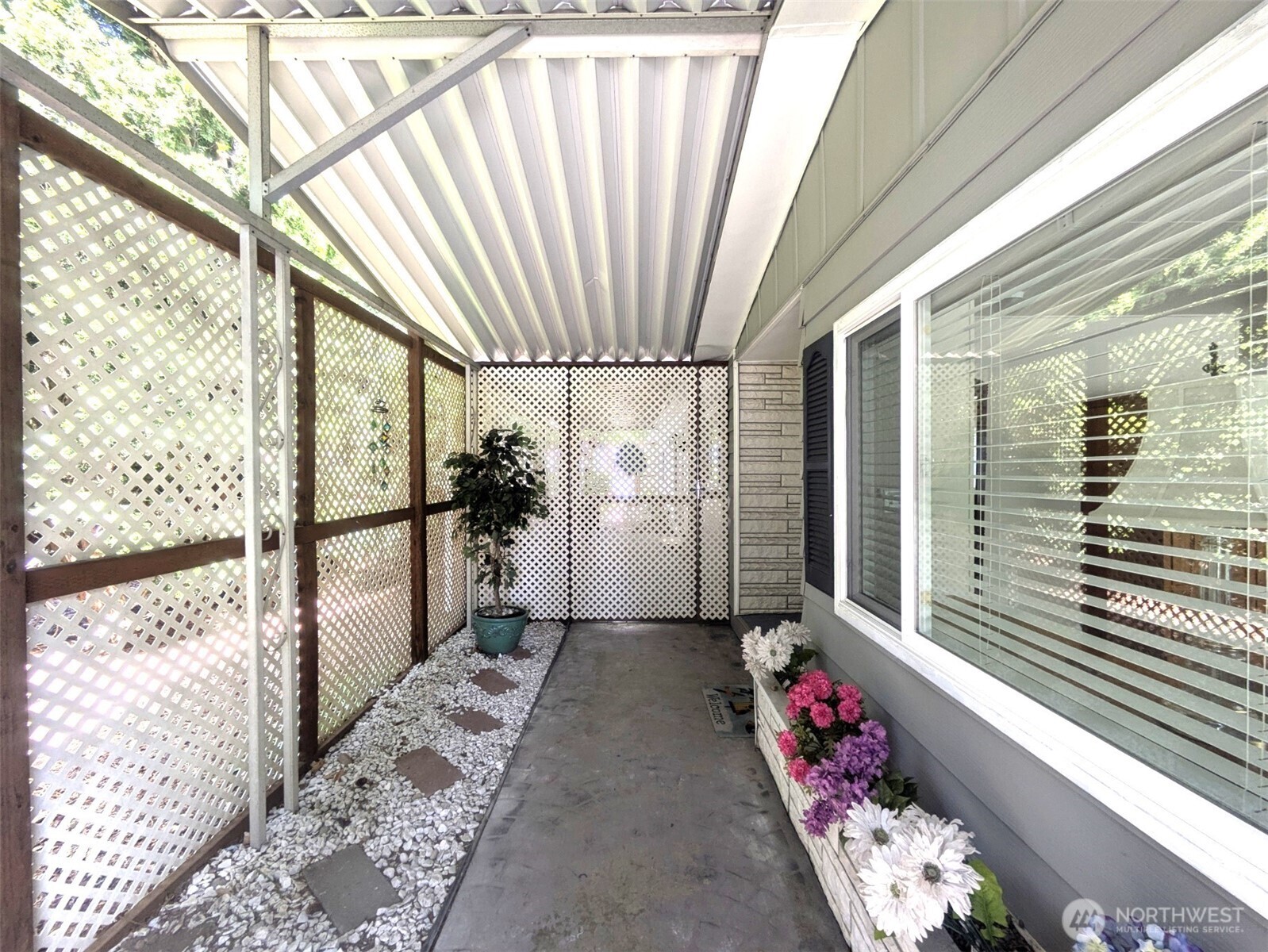Beautiful entry walking up to the front door. Closed lattice door opens to your private oasis! Must see.