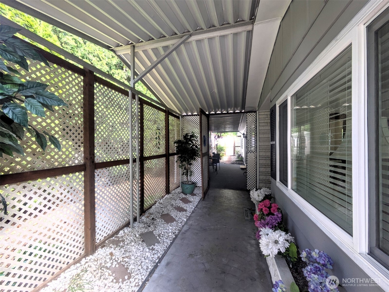 With the door open to the enclosed outdoor living space.