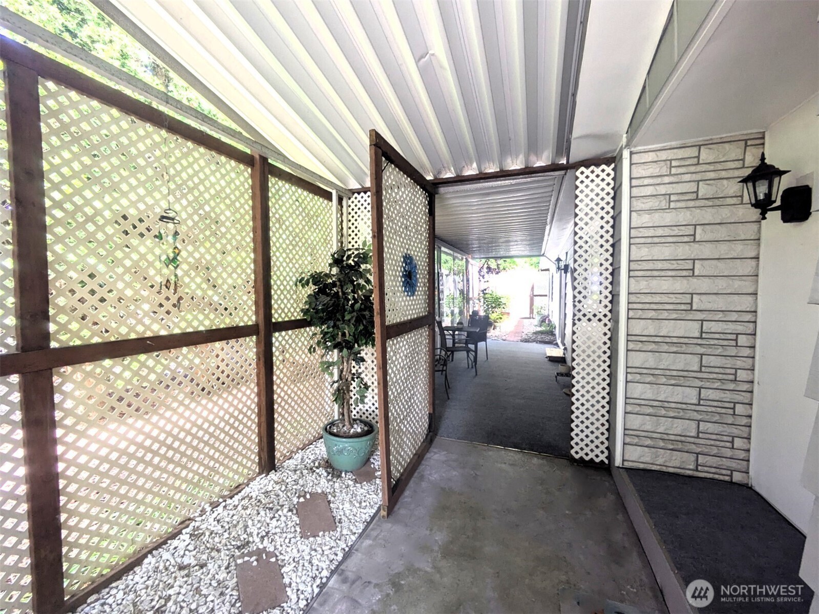 Enclosed patio through the doors.