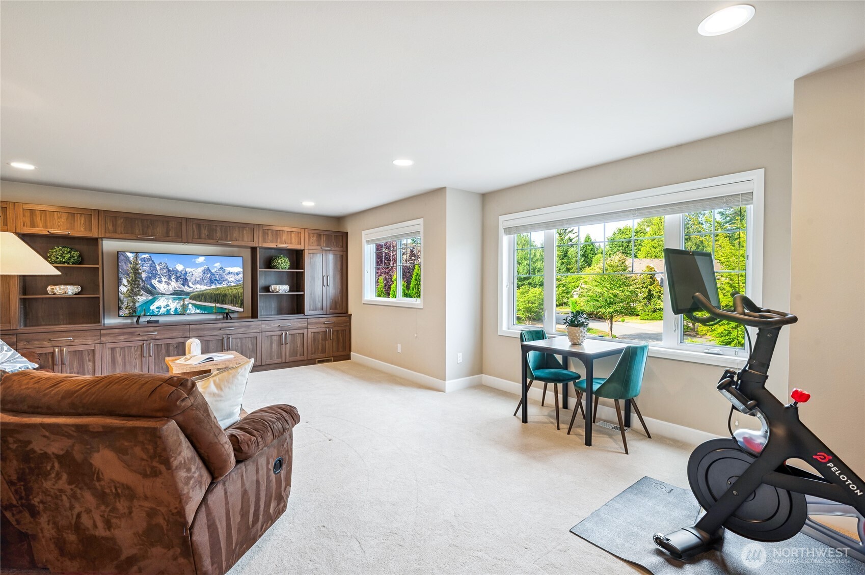 Rec/media/game room with built in entertainment cabinets offers endless possibilities.